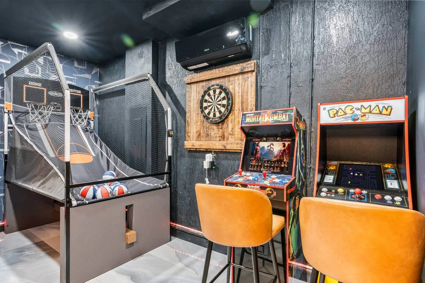 Arcade machines, basketball shootout and dartboard