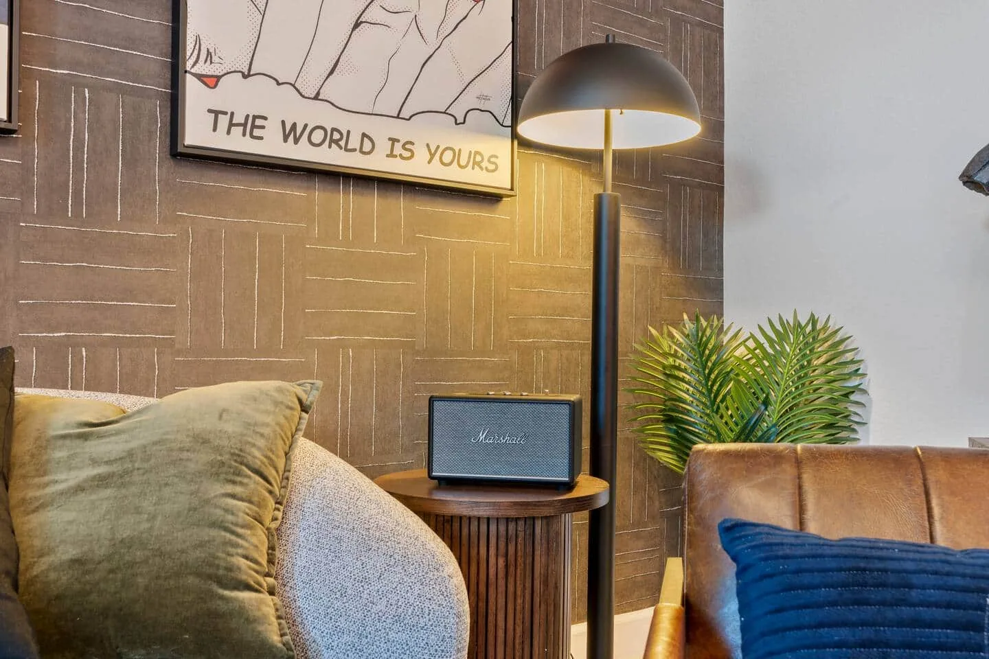 Living room corner with lamp and artwork